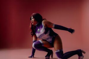dynamic cosplay portrait on pink backdrop