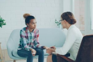 teen counseling session in modern office
